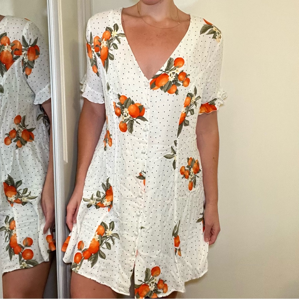 White Dress with Polka Dots and Orange Pattern